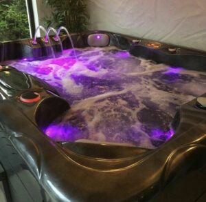 Hot tub with red led lights image